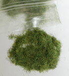 Dark green grass fibres (4.5-6mm)