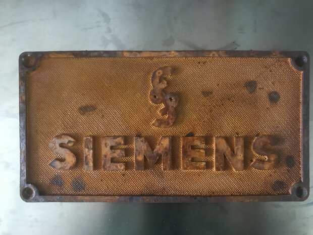 Resin copy of an  original plate Siemens with logo